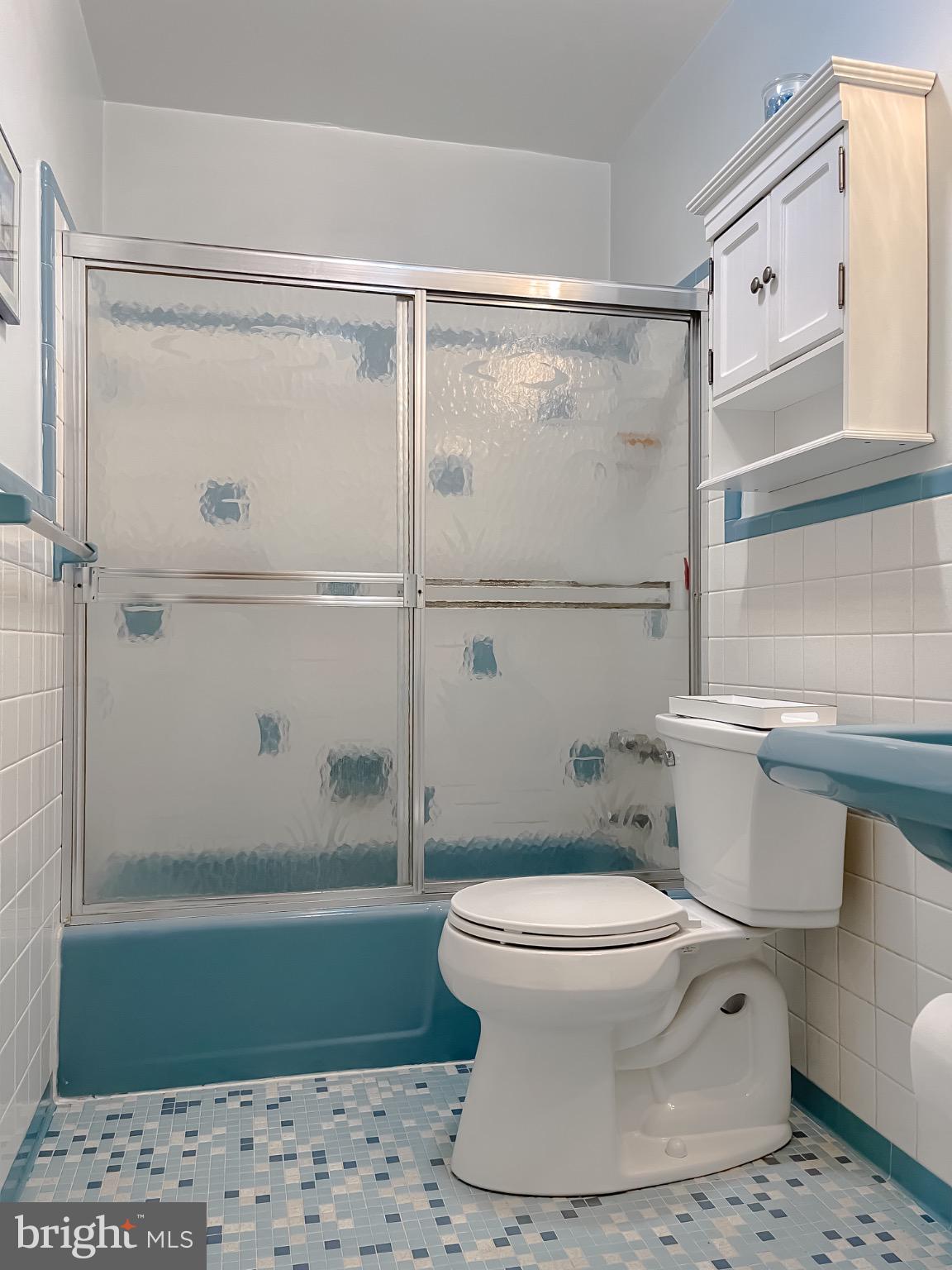 49078 Wynne Road Ridge, MD 20680 - Photo 25 of 57 Charming bathroom with retro tile accents.