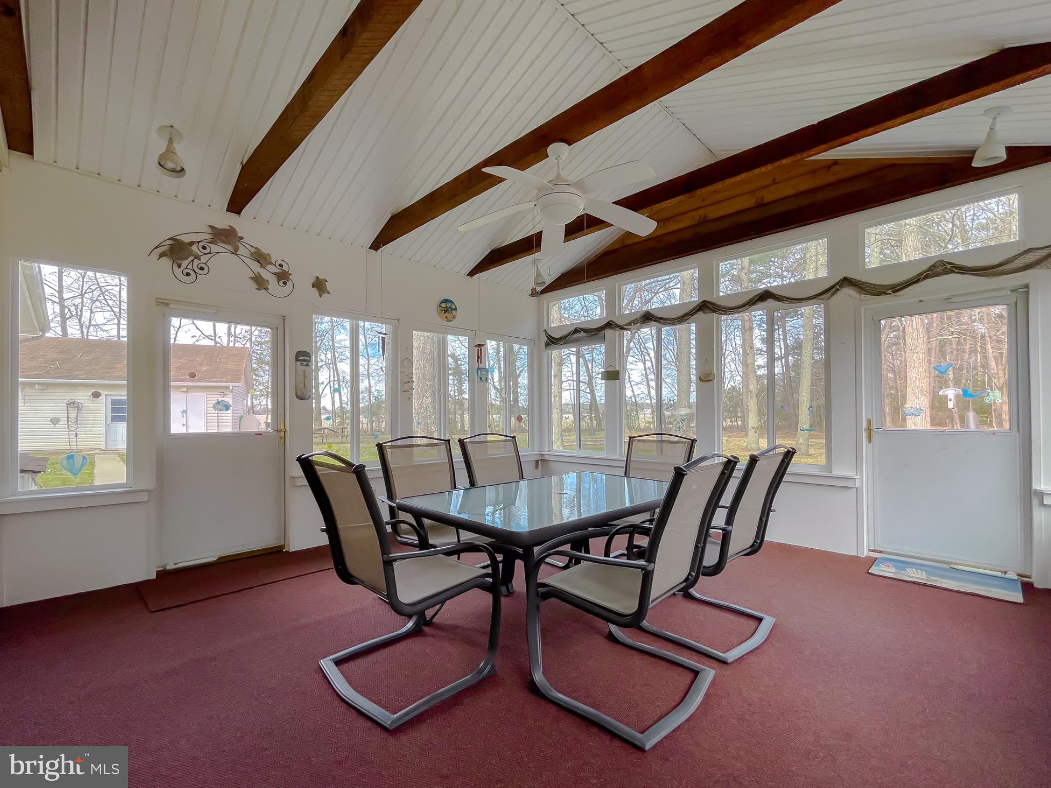 49078 Wynne Road Ridge, MD 20680 - Photo 36 of 57 Bright enclosed porch with scenic outdoor views.