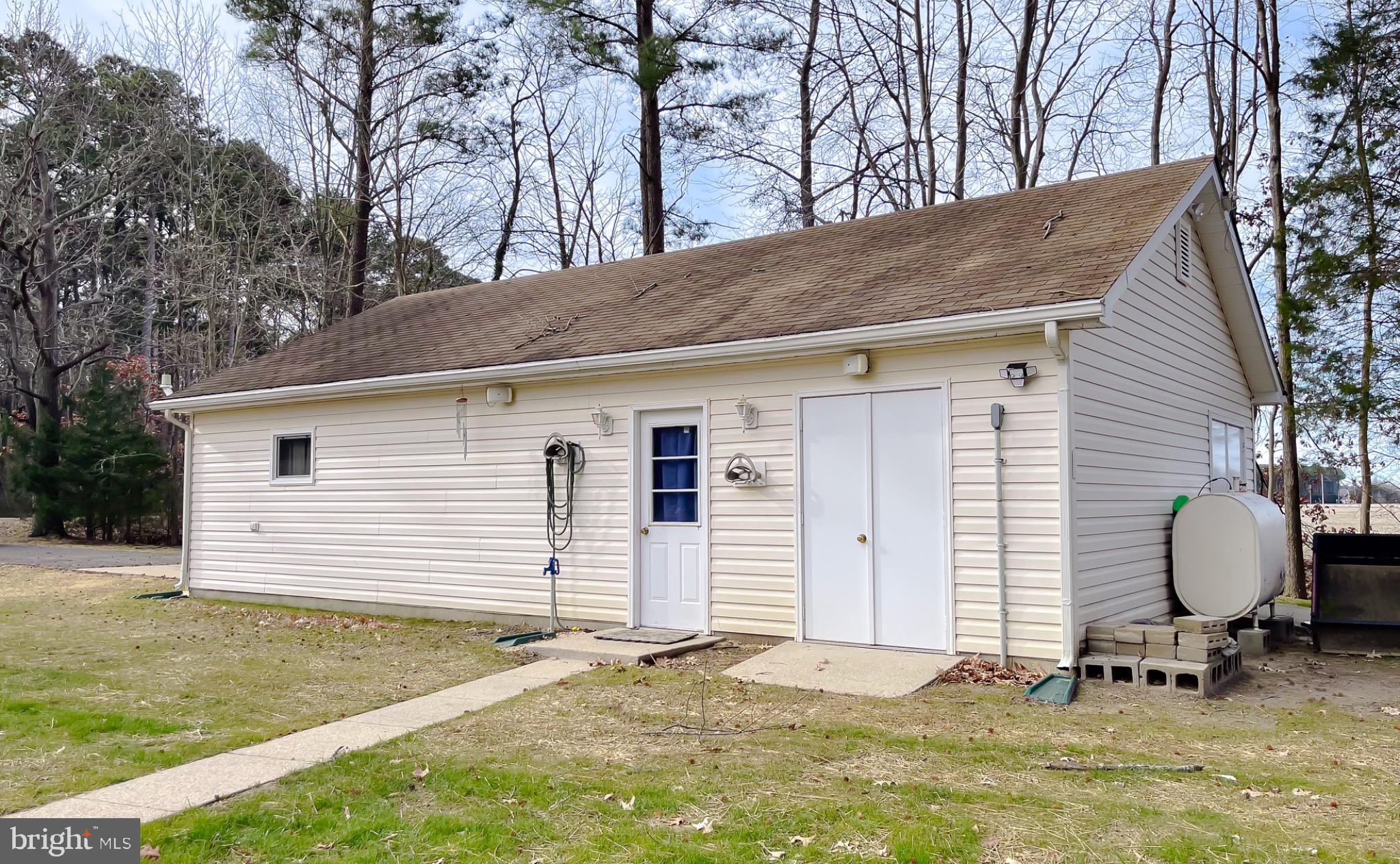 49078 Wynne Road Ridge, MD 20680 - Photo 41 of 57 Oversized garage with workshop