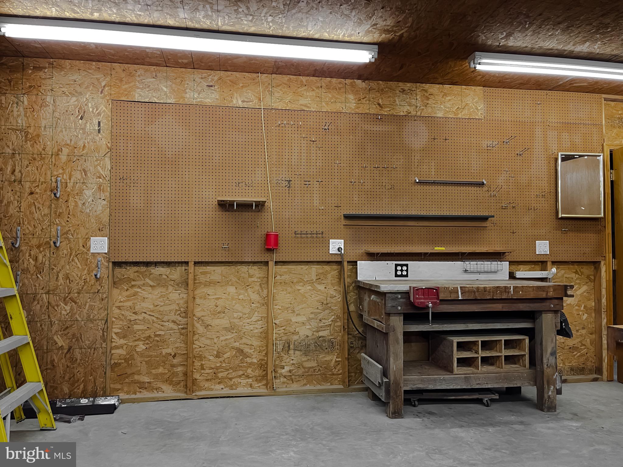 49078 Wynne Road Ridge, MD 20680 - Photo 55 of 57 Spacious workshop.