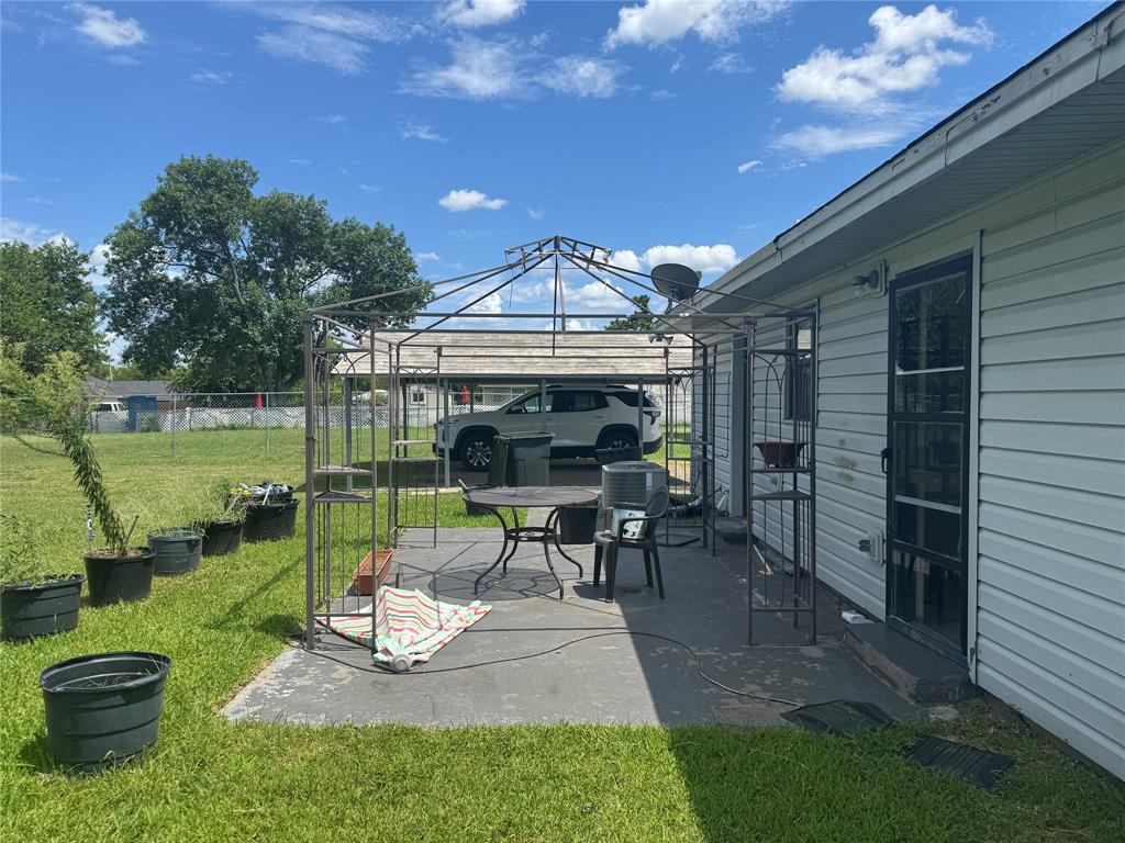 207 College Mound Road Terrell, TX 75160 - Photo 8 of 14 Rear concrete patio with metal gazebo frame