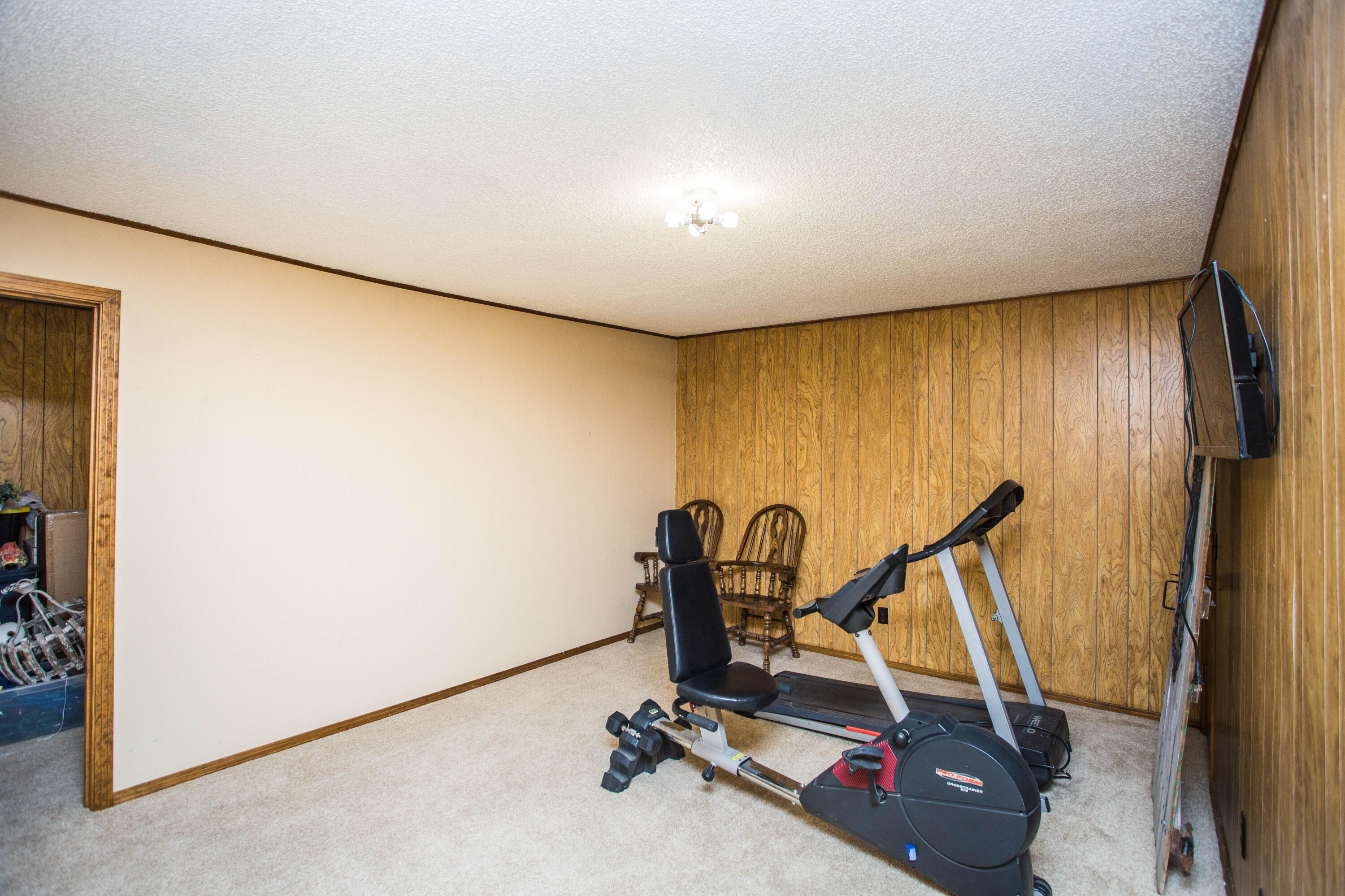 1304 Jefferson Drive Plainview, TX 79072 - Photo 40 of 50 a view of a room with gym equipment
