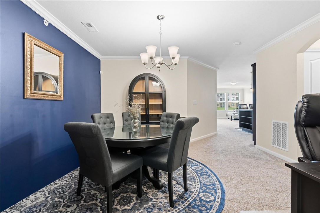 141 Old Pond Road Springboro, OH 45066 - Photo 12 of 20 This refined dining area offers an elegant setting for gatherings.