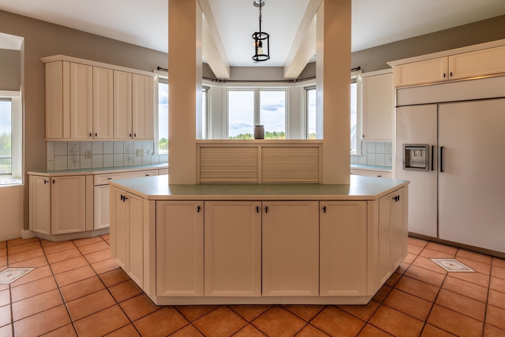 184 W Road Bernardston, MA 01337 - Photo 19 of 41 a kitchen with granite countertop white cabinets and white appliances