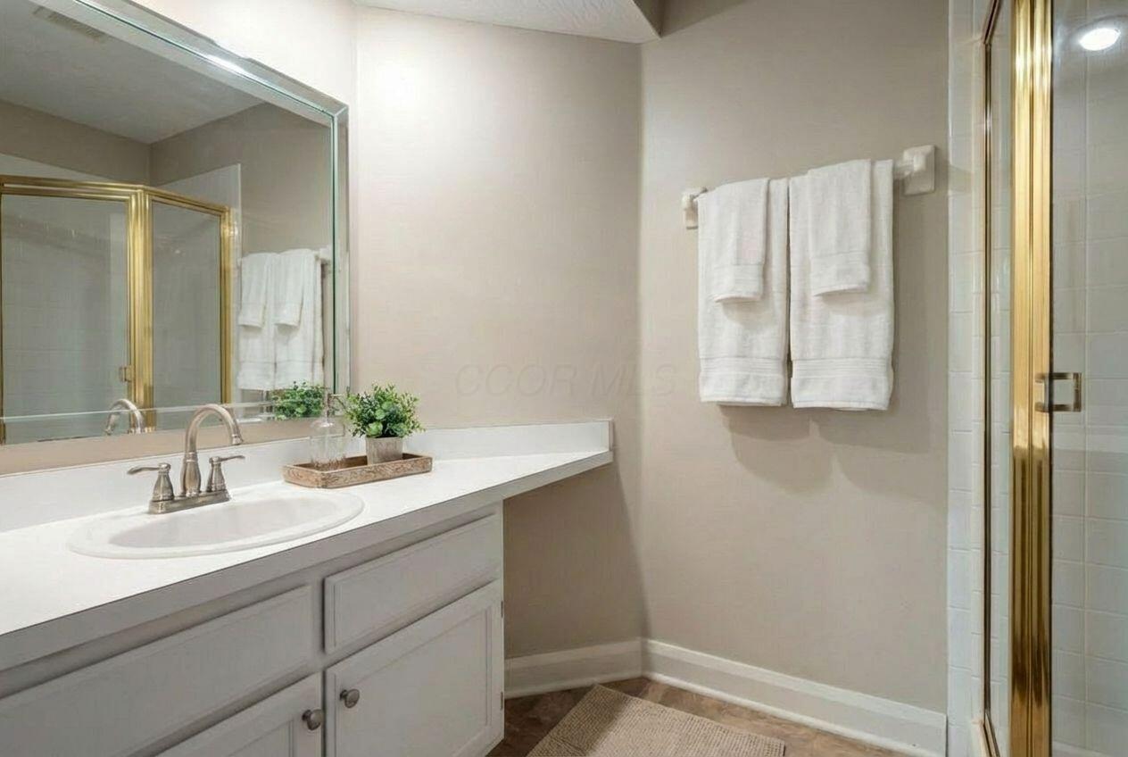 6770 Heatherstone Loop Dublin, OH 43017 - Photo 28 of 32 Virtually staged guest bathroom