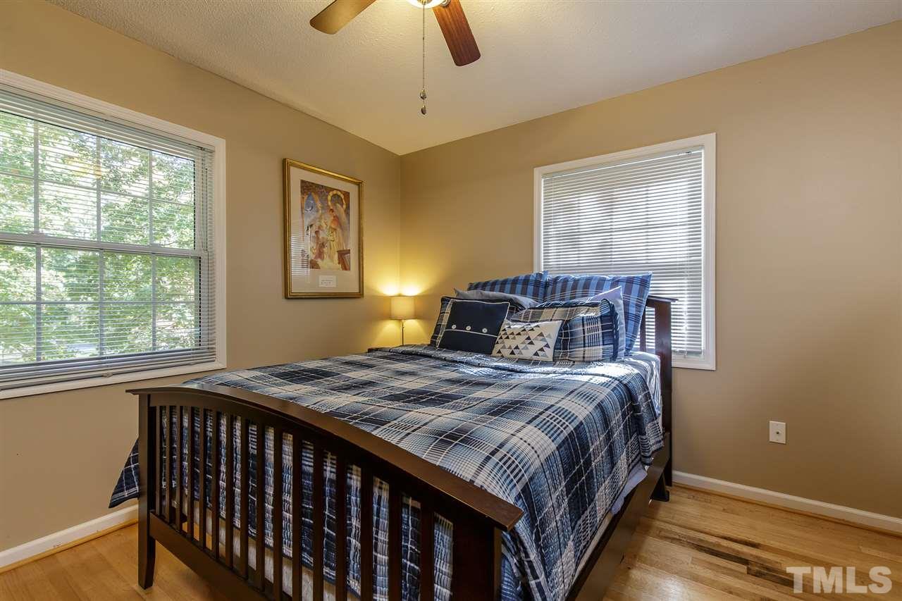 1901 Wellington Road Burlington, NC 27217 - Photo 14 of 24 Bedroom 2 is across the hall from the master and has large window and hardwood floors