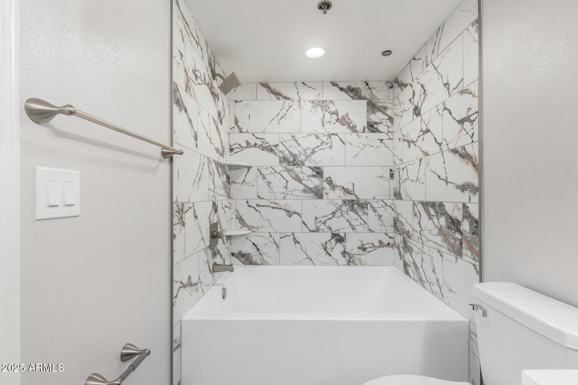2134 East Broadway Road, Unit 1035 Tempe, AZ 85282 - Photo 22 of 31 a bathroom with a bathtub and shower