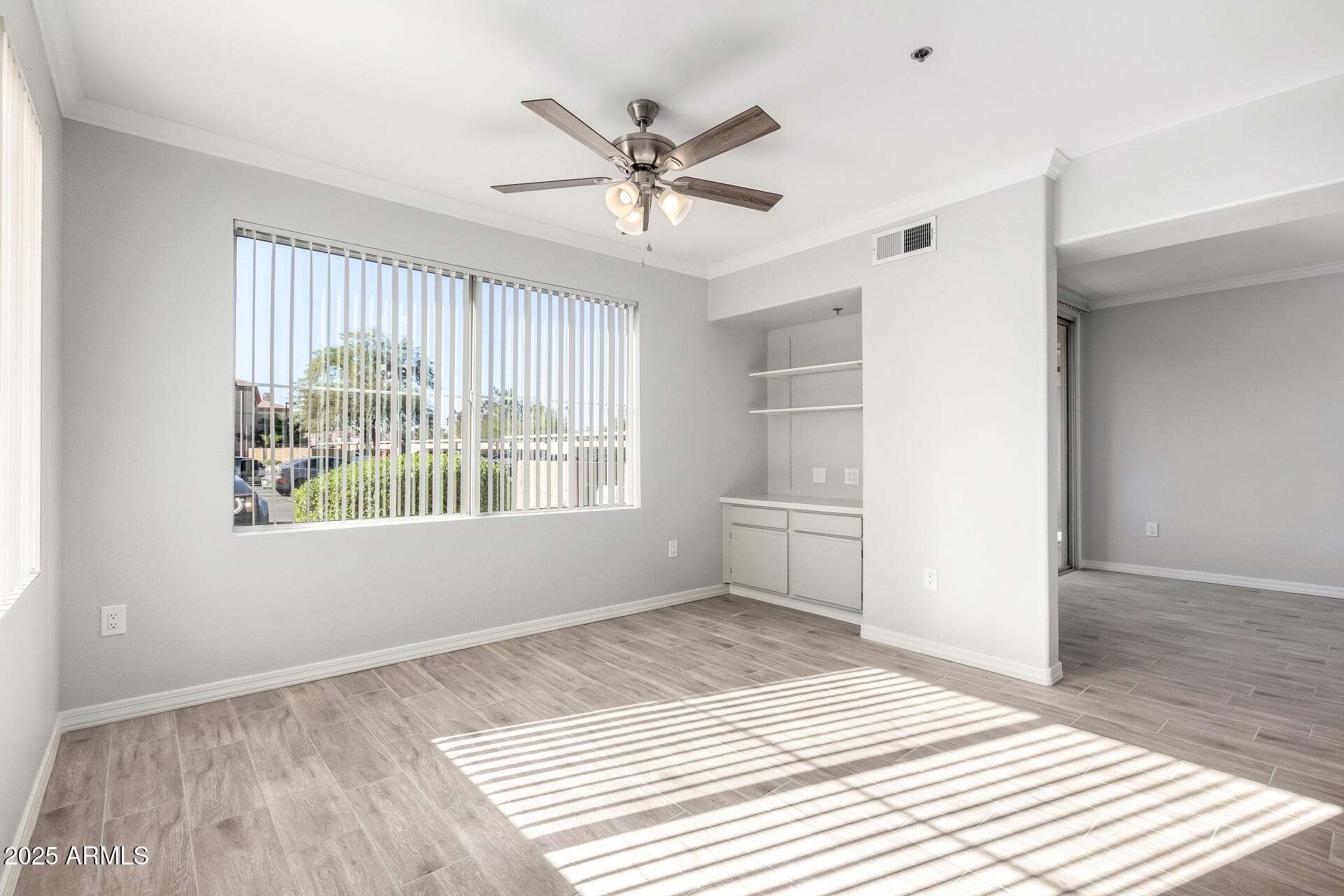 2134 East Broadway Road, Unit 1035 Tempe, AZ 85282 - Photo 5 of 31 a bedroom with a bed and a window
