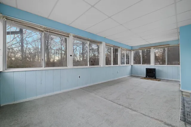 an empty room with windows