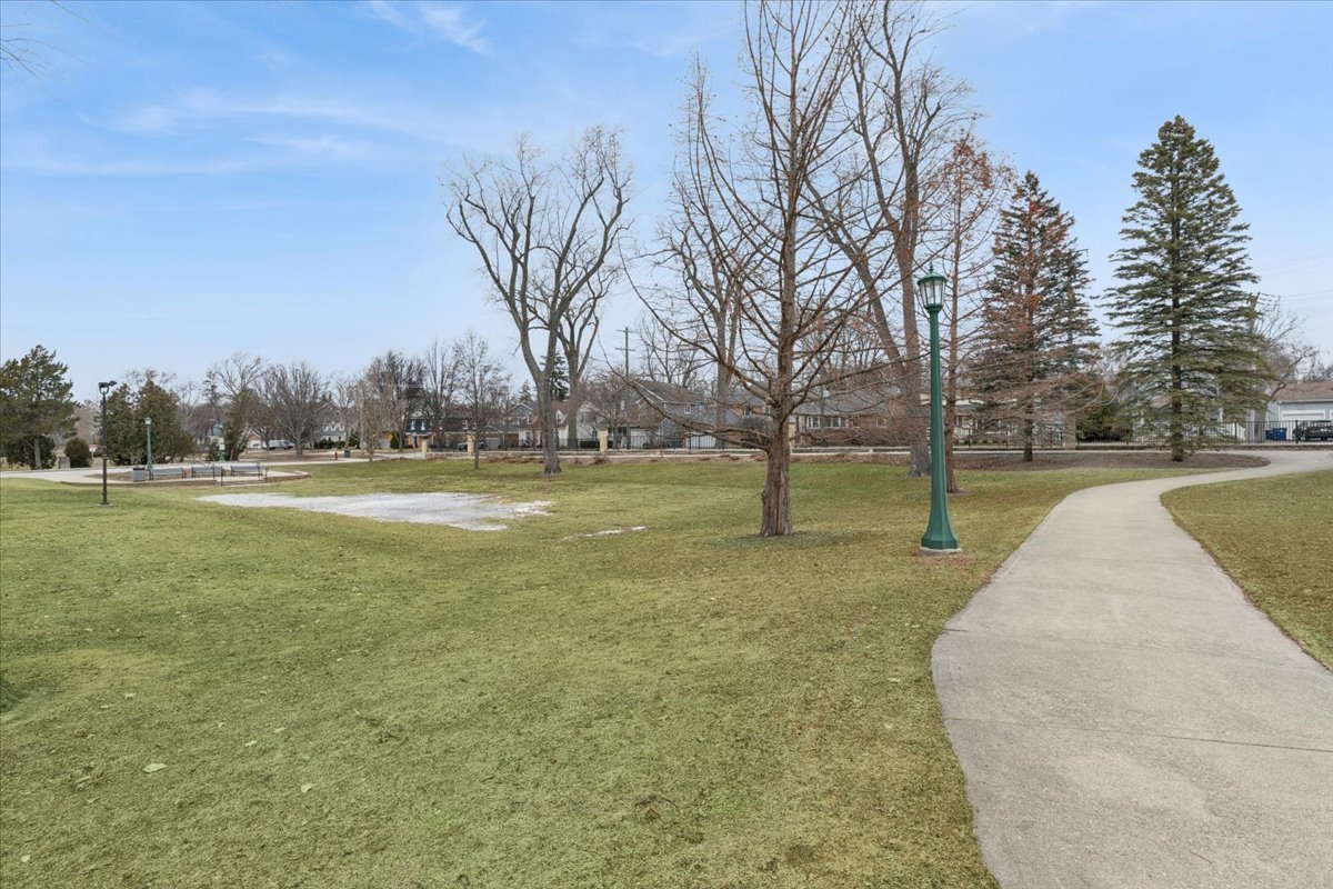 1041 Ridge Road, Unit 304 Wilmette, IL 60091 - Photo 20 of 30 a view of outdoor space with deck and trees