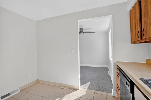 a view of kitchen and utility room