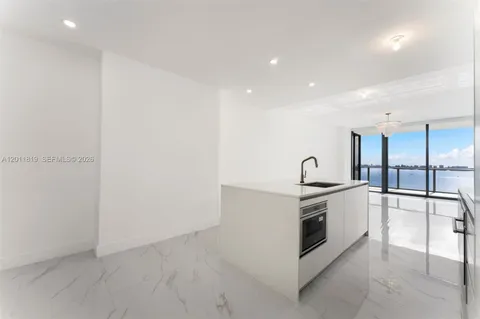 wooden floor and window in an empty room