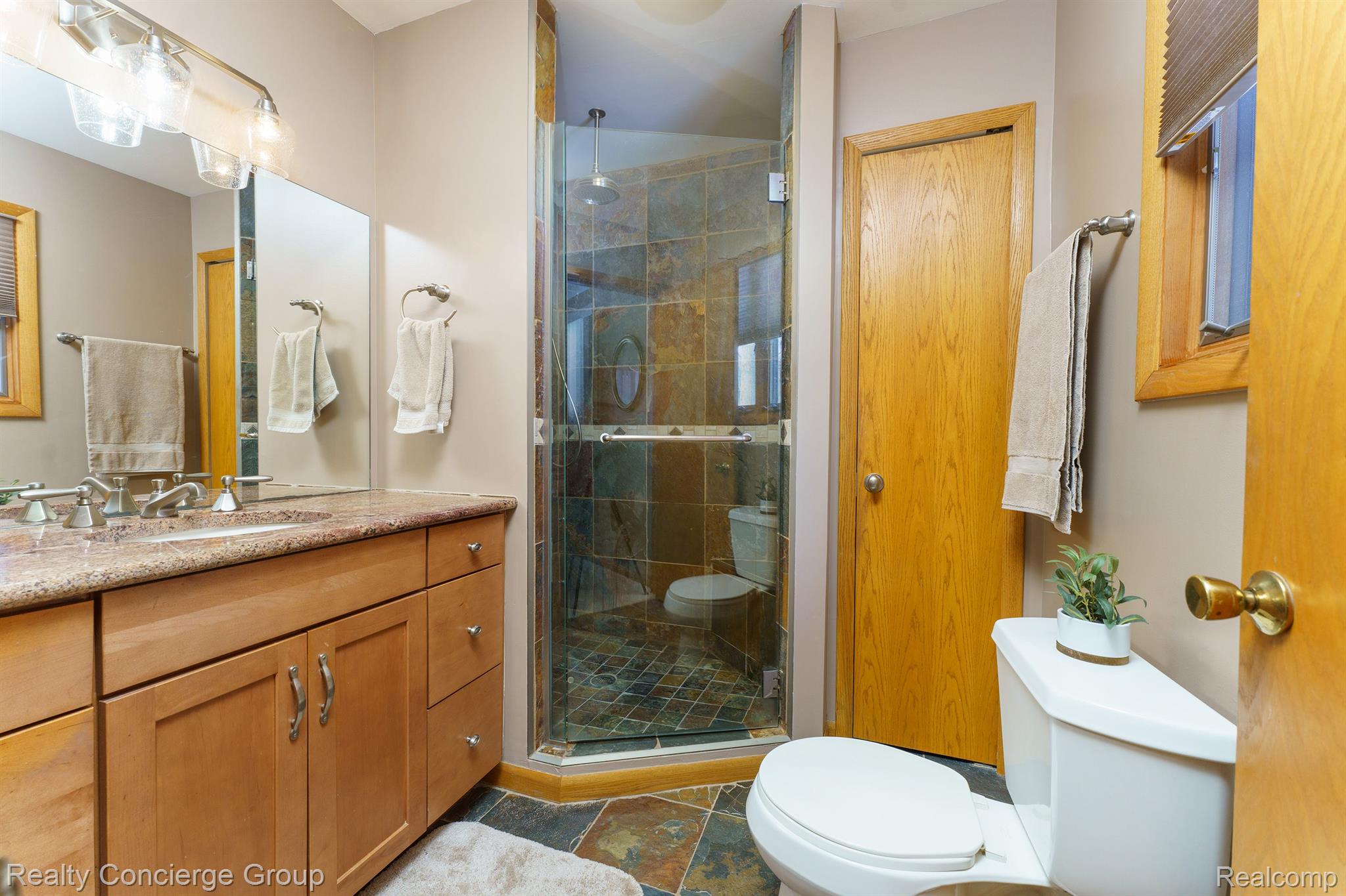 7170 Cowell Road Brighton, MI 48116 - Photo 19 of 38 Updated primary bath w/ walk-in shower