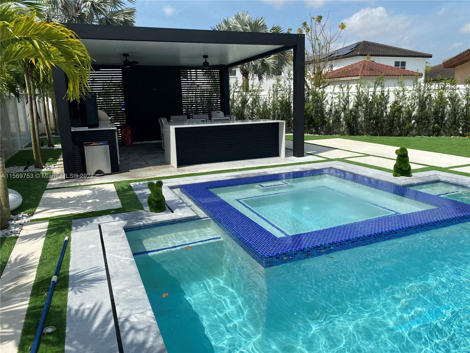 16976 Southwest 90th Terrace Miami, FL 33196 - Photo 21 of 90 a view of swimming pool with a patio