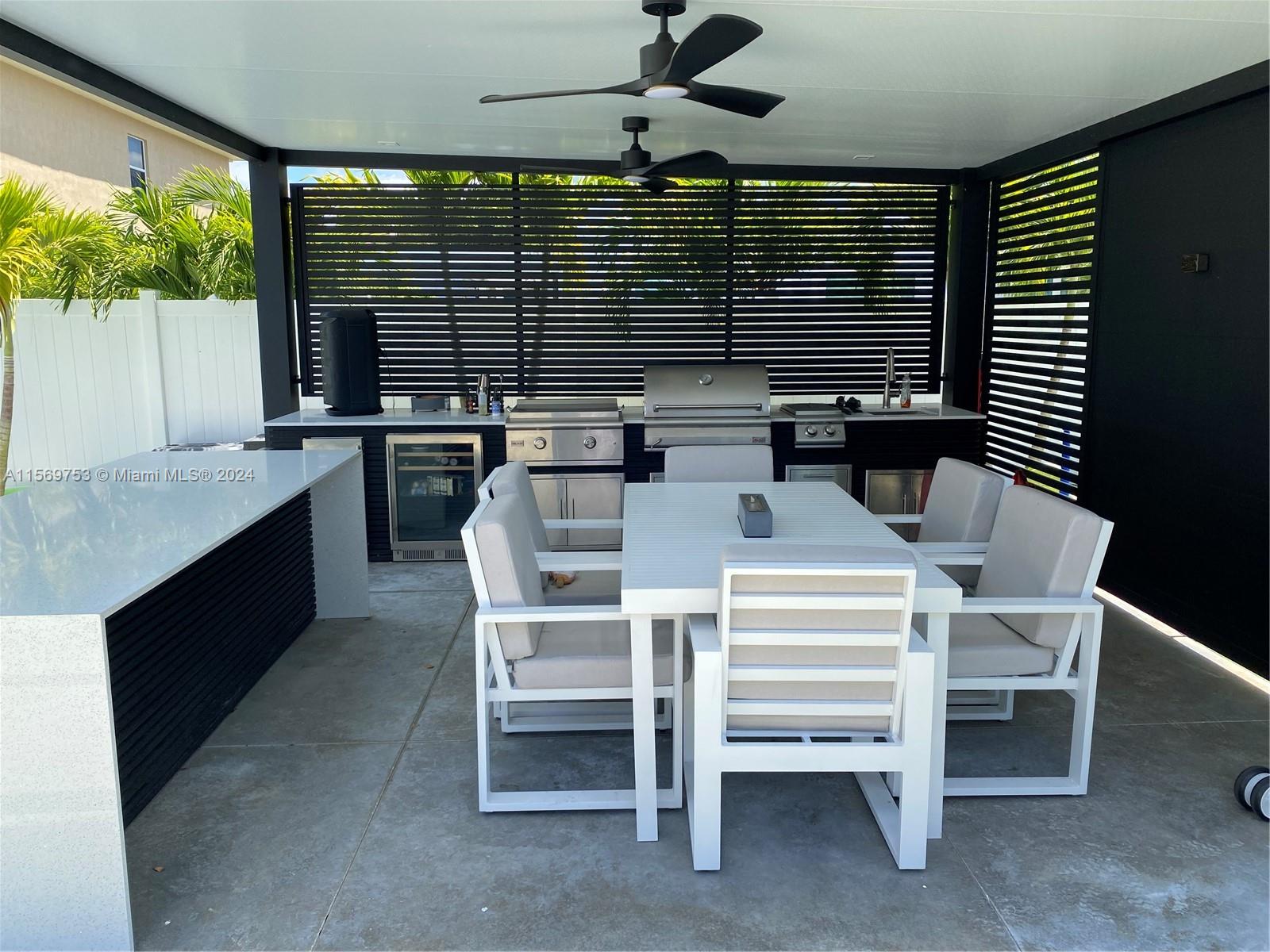 16976 Southwest 90th Terrace Miami, FL 33196 - Photo 23 of 90 a view of a dining room with furniture