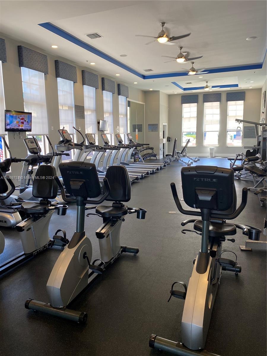 16976 Southwest 90th Terrace Miami, FL 33196 - Photo 79 of 90 a view of a room with gym equipment
