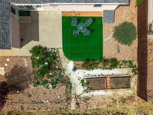 a house view with a backyard space