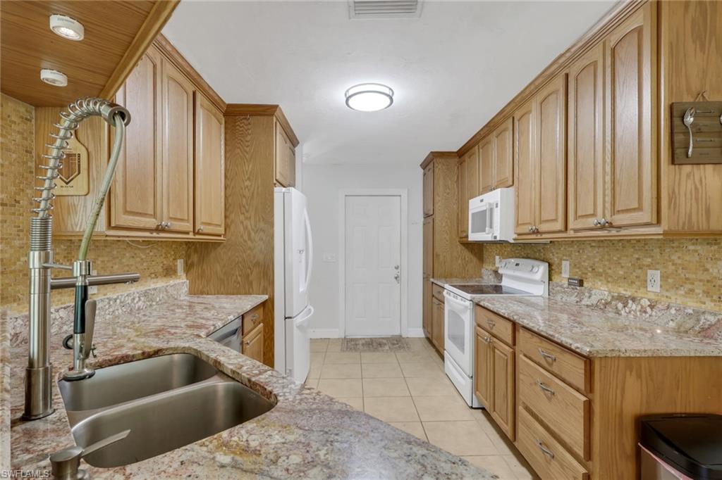 3425 29th Avenue Southwest Naples, FL 34117 - Photo 11 of 49