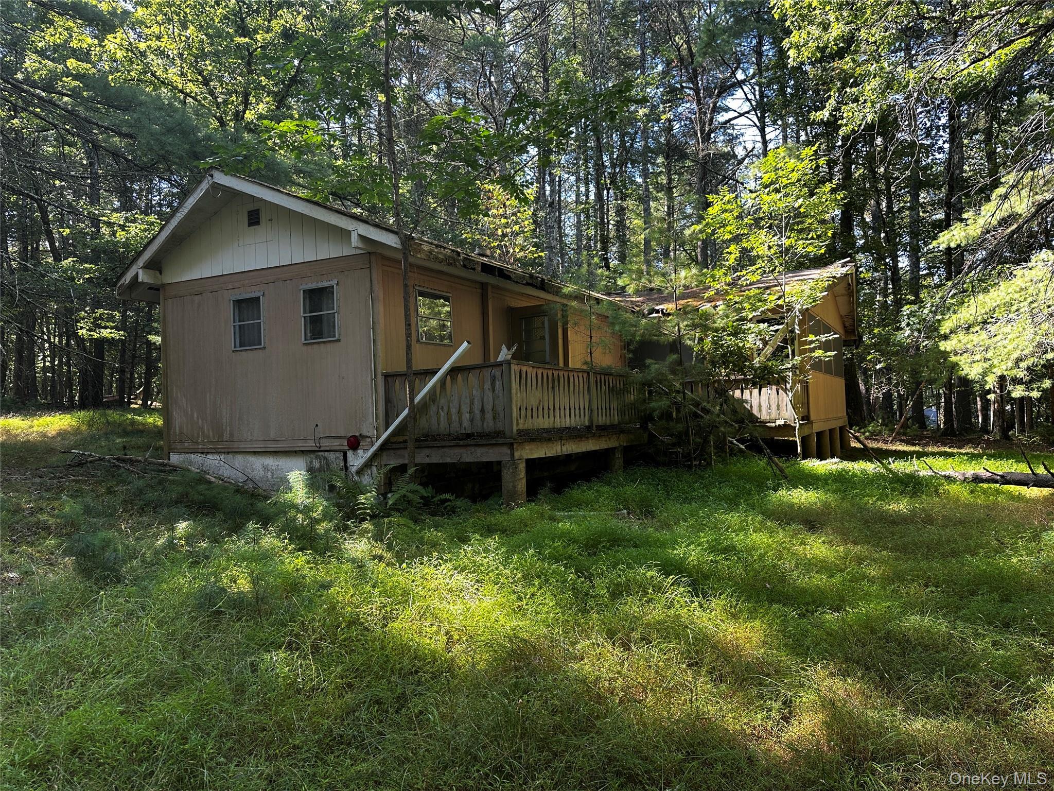 8 Kern Road Barryville, NY 12719 - Photo 4 of 14 a backyard of a house with lots of green space
