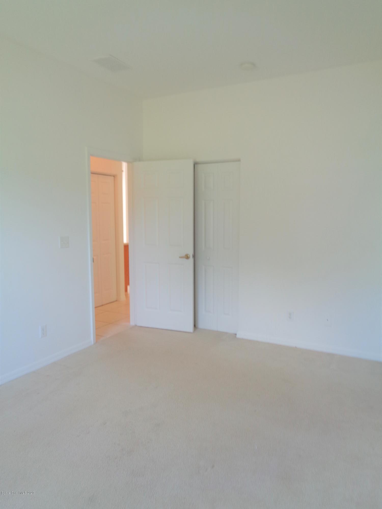 1630 Degroodt Road Southwest Palm Bay, FL 32908 - Photo 21 of 31 Guest Bedroom