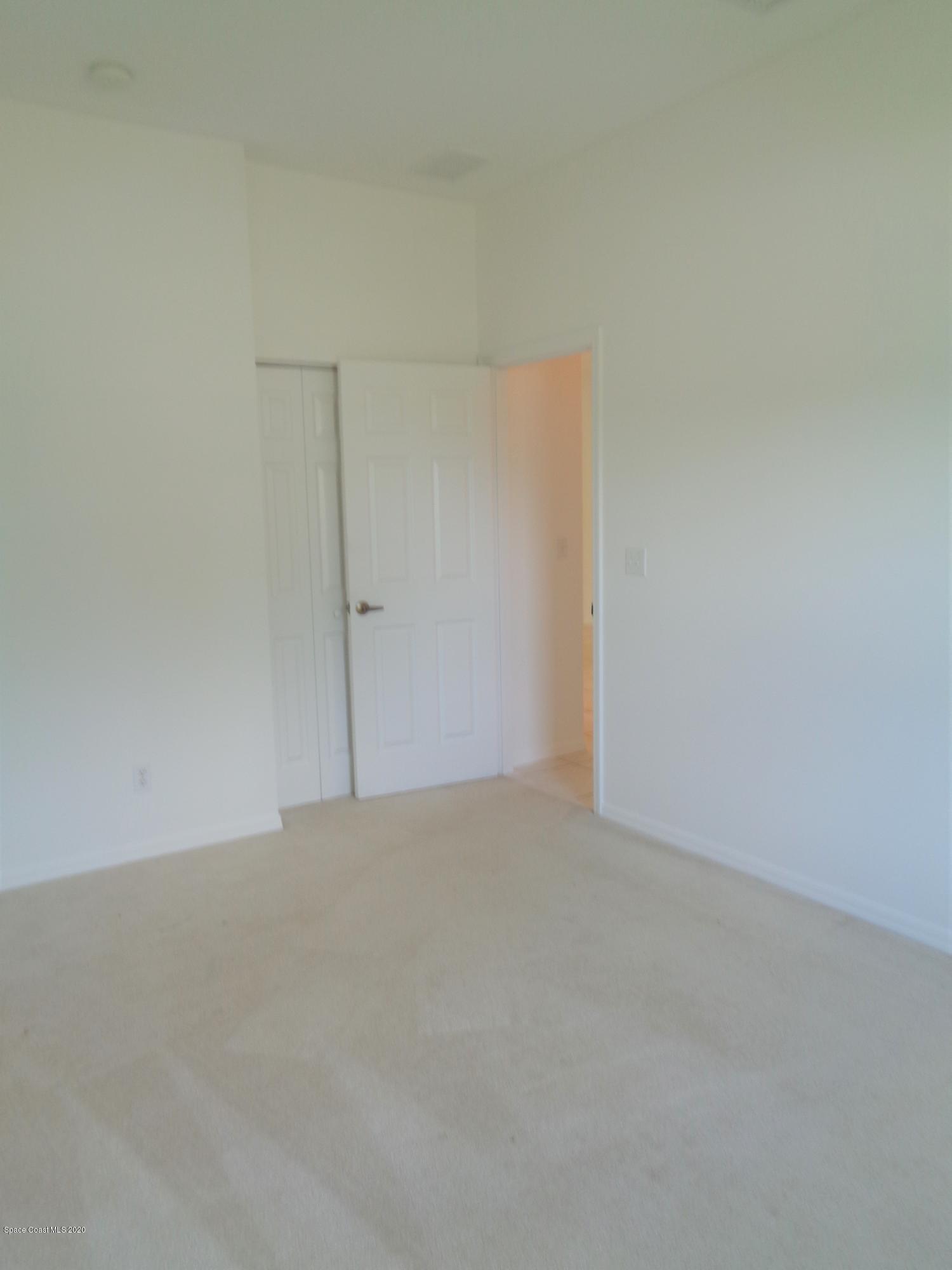 1630 Degroodt Road Southwest Palm Bay, FL 32908 - Photo 22 of 31 Guest Bedroom