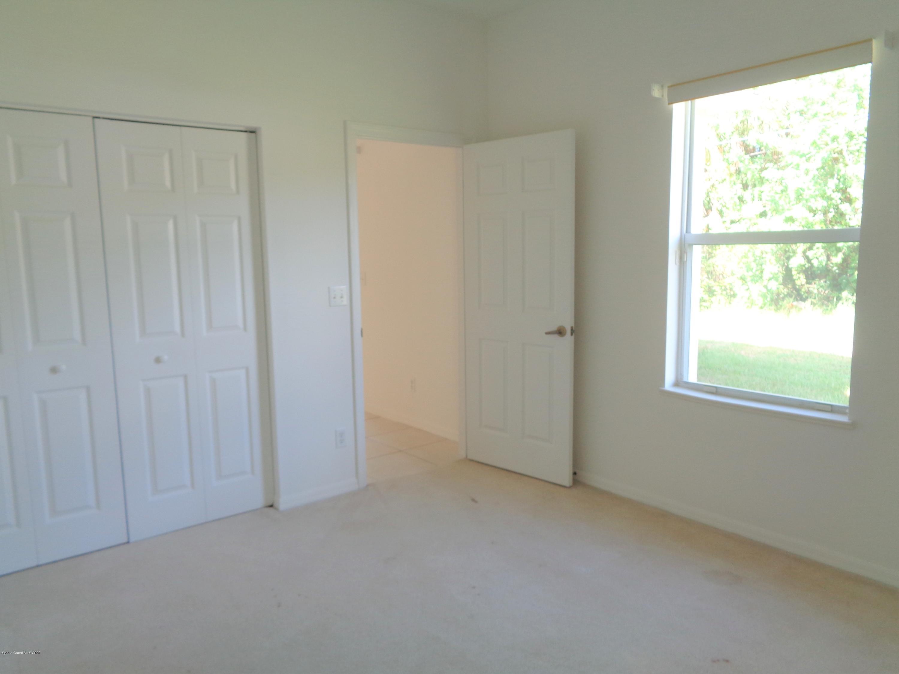 1630 Degroodt Road Southwest Palm Bay, FL 32908 - Photo 25 of 31 Guest Bedroom/Office