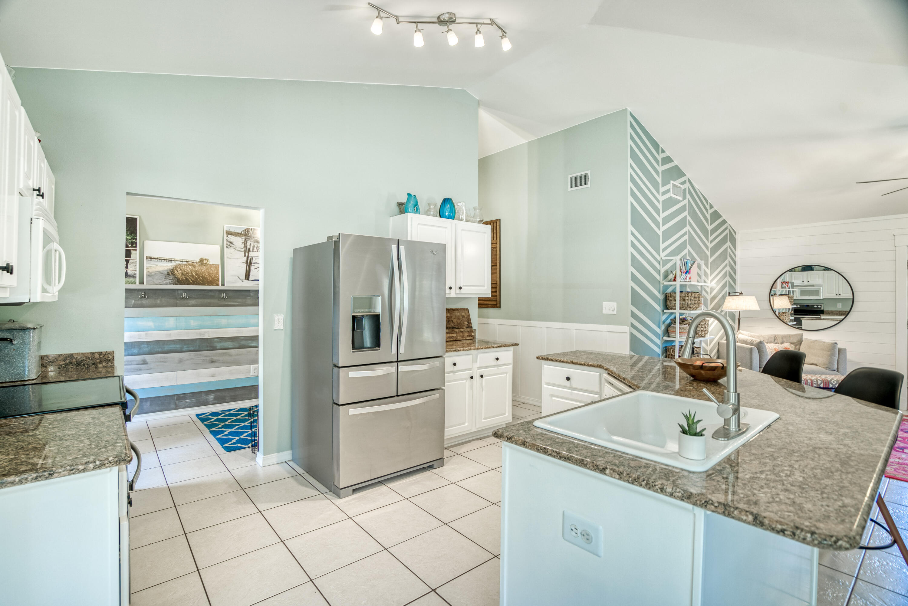 3937 Mesa Road Destin, FL 32541 - Photo 8 of 60 a kitchen with a refrigerator sink and stove