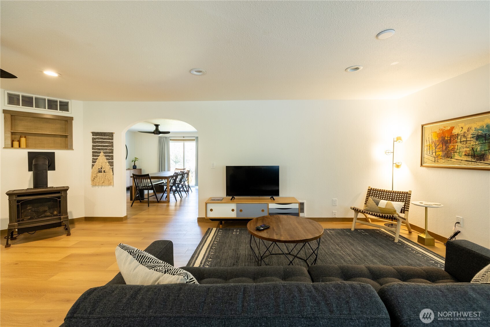 430 Twilight Way Grapeview, WA 98546 - Photo 2 of 22 a living room with furniture and a flat screen tv