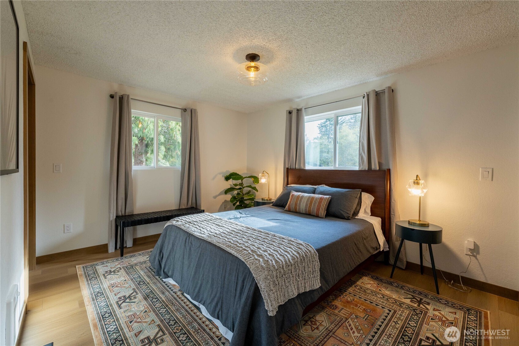 430 Twilight Way Grapeview, WA 98546 - Photo 7 of 22 a bedroom with a bed and a window