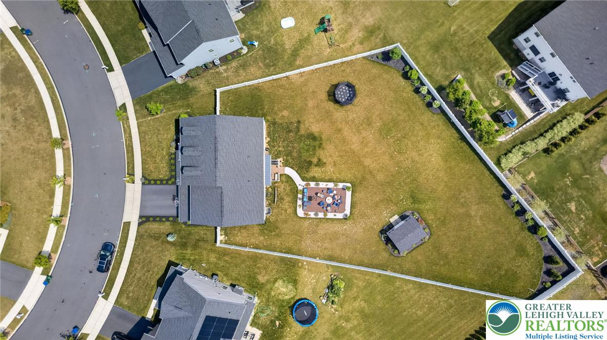 3952 Orth Street Bethlehem, PA 18020 - Photo 56 of 60 An aerial perspective reveals a spacious fenced yard with a well-appointed outdoor patio area.