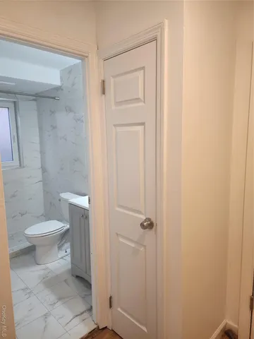 a bathroom with a toilet
