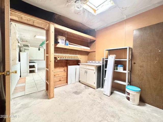 a view of a kitchen with wooden floor