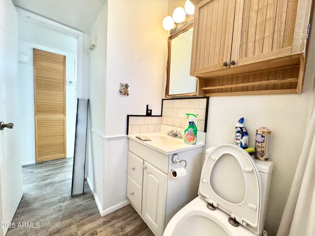 a bathroom with a sink a washer and dryer