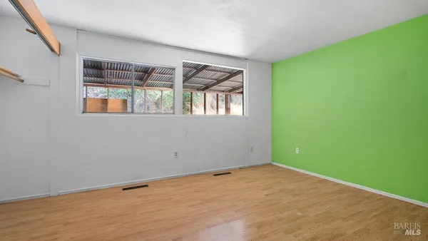 an empty room with window