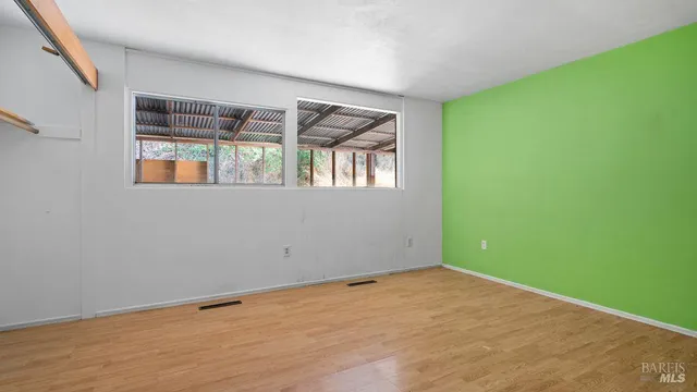 an empty room with window