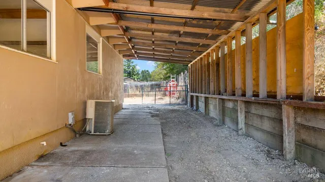 a view of outdoor space with wooden fence