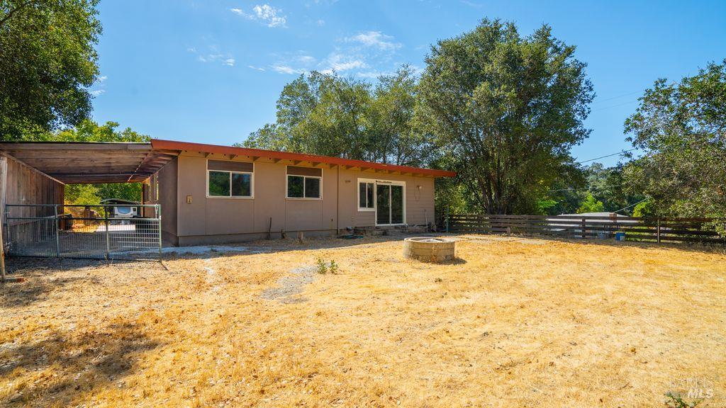 40 El Rancho Drive Cloverdale, CA 95425 - Photo 31 of 44 a swimming pool with outdoor seating and yard