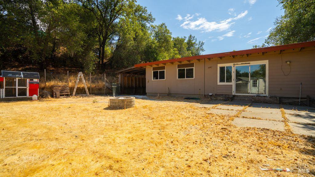 40 El Rancho Drive Cloverdale, CA 95425 - Photo 33 of 44 a house with trees in front of it