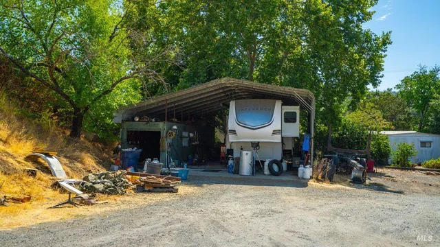 a view of a car park in front of house