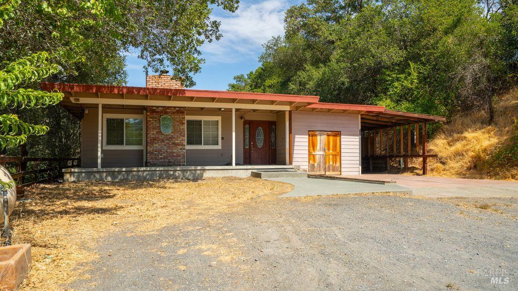 40 El Rancho Drive Cloverdale, CA 95425 - Photo 40 of 44 a front view of a house with a garden