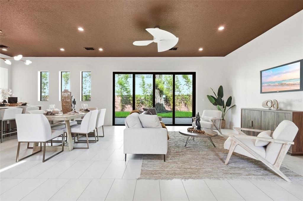 1615 Cole Road Orlando, FL 32803 - Photo 6 of 31 a living room with furniture and a large window