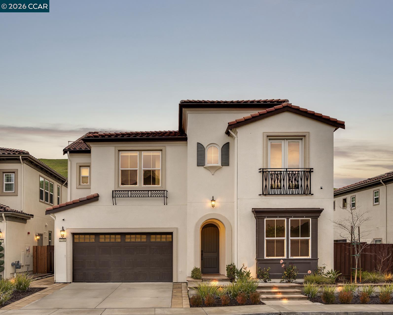 2130 Elderberry Drive San Ramon, CA 94582 - Photo 1 of 1 a front view of a house with garden