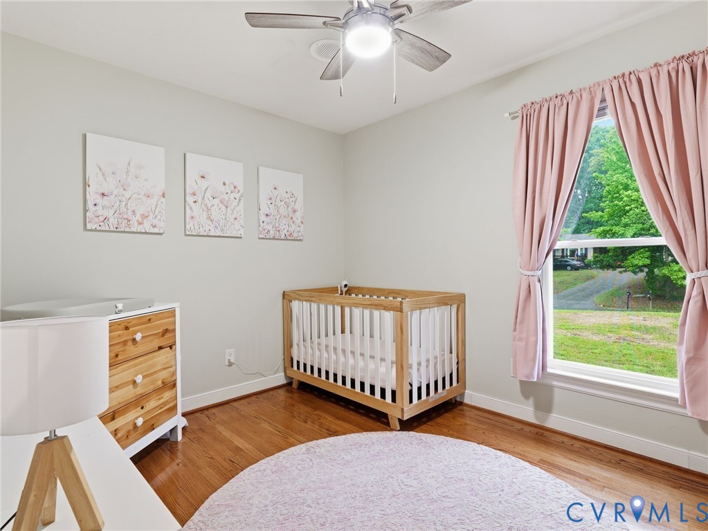 7707 Woodbrook Road Quinton, VA 23141 - Photo 20 of 42 Hardwood flooring, light gray wall paint, and a ce