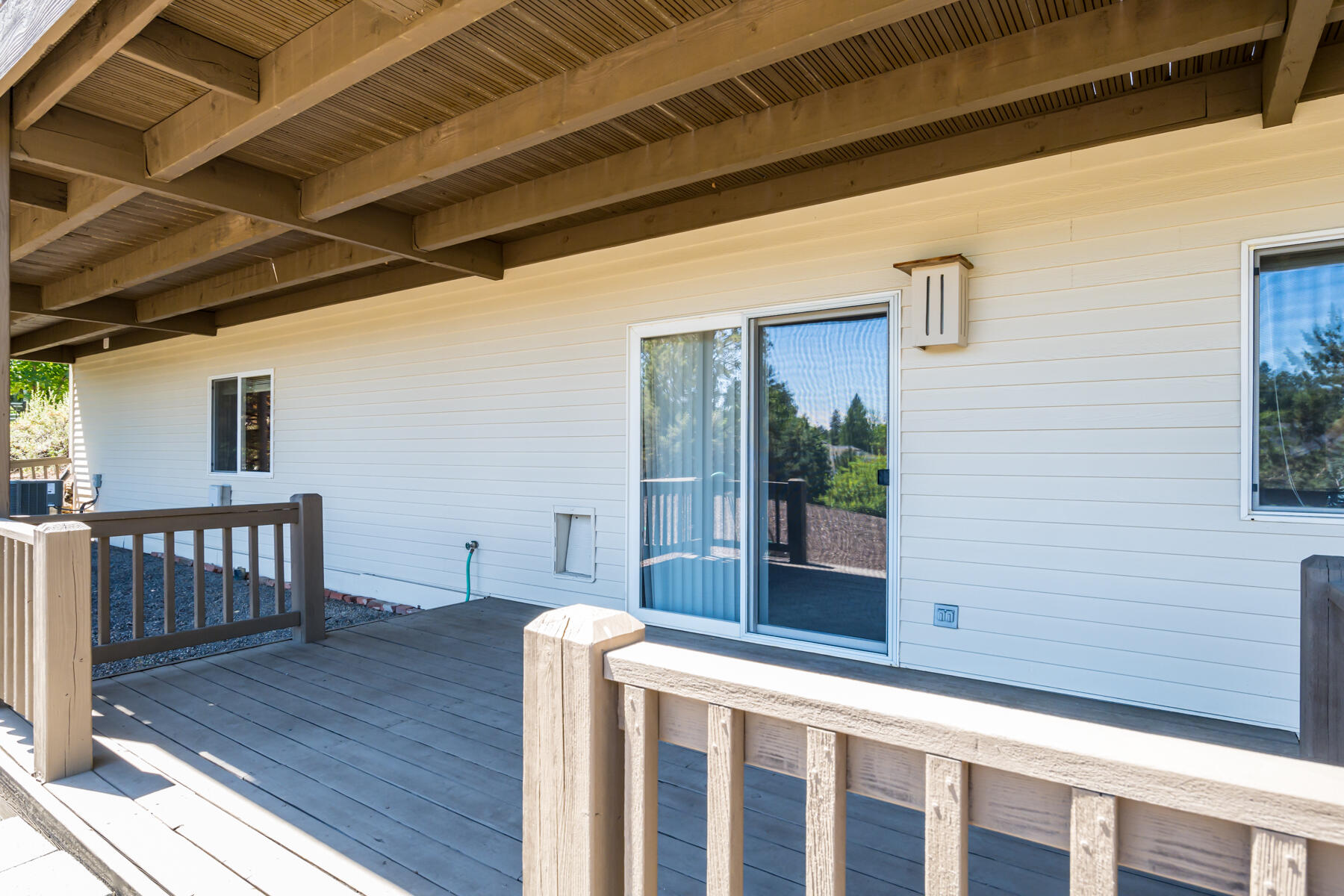 61524 Southeast Hill Ridge Road Bend, OR 97702 - Photo 38 of 49 lower deck off the basement