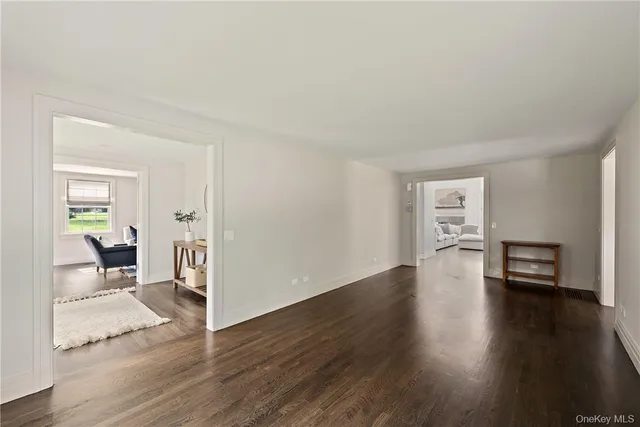 a view of a livingroom with wooden floor
