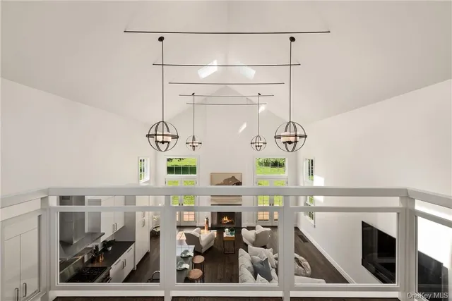 a view of living room with furniture and window