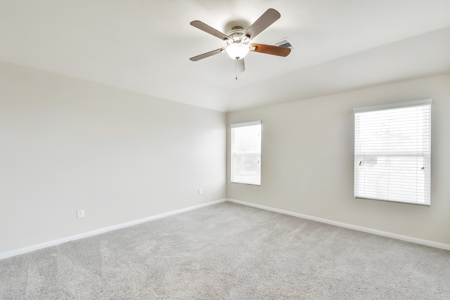 10930 Chestnut Path Way Tomball, TX 77375 - Photo 11 of 18 an empty room with a window and a fan