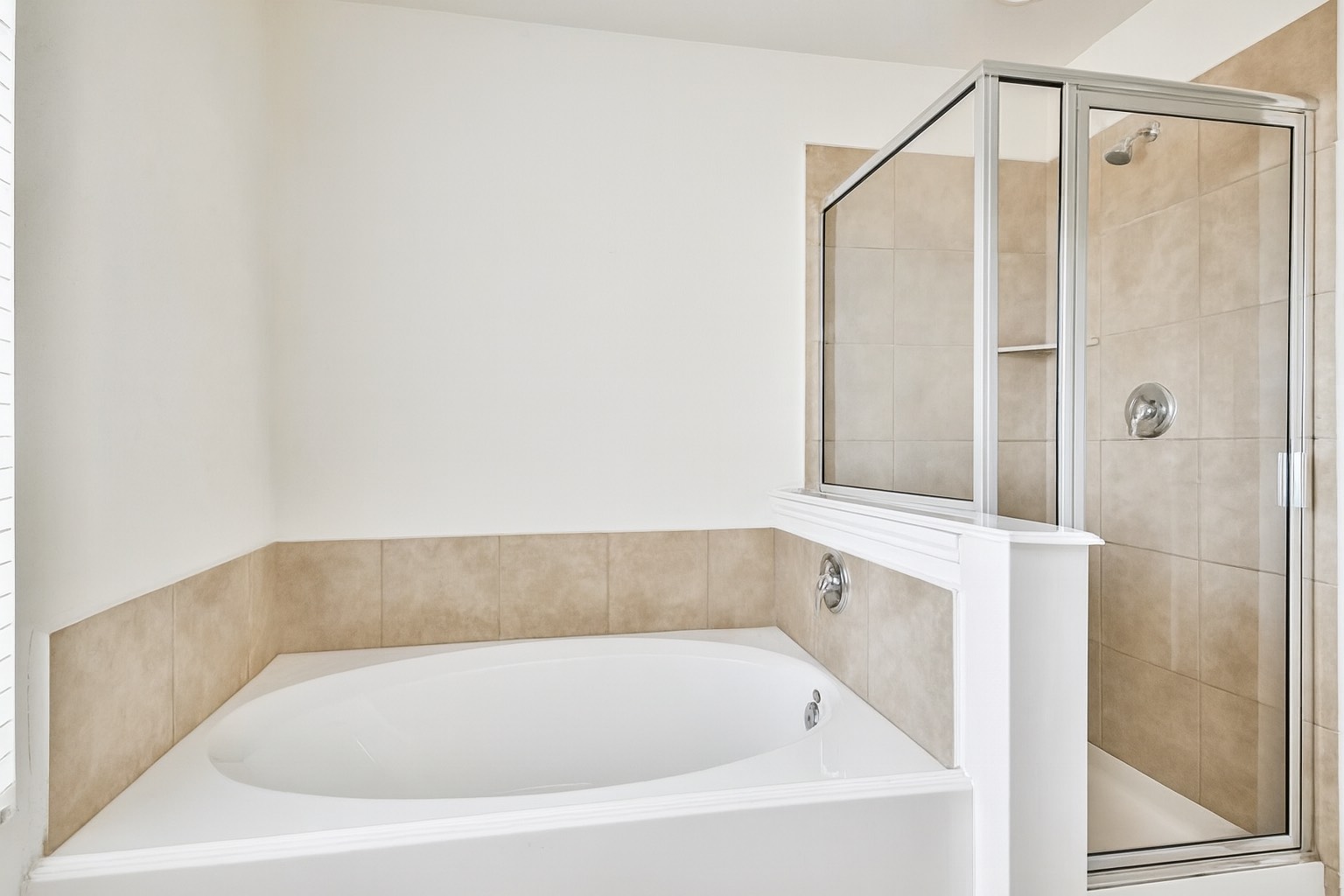 10930 Chestnut Path Way Tomball, TX 77375 - Photo 13 of 18 a bathroom with a bathtub and shower