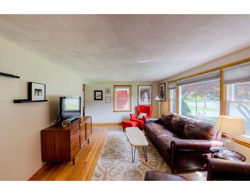 56 Edgewood Street Three Rivers, MA 01080 - Photo 17 of 30 a living room with furniture and a flat screen tv