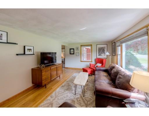 56 Edgewood Street Three Rivers, MA 01080 - Photo 20 of 30 a living room with furniture and a flat screen tv